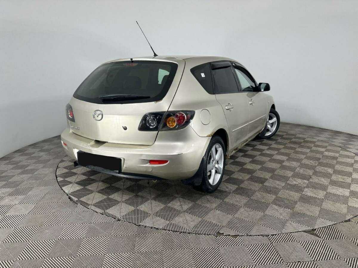 Mazda 3 с пробегом — 2006 год. Фото: #5
