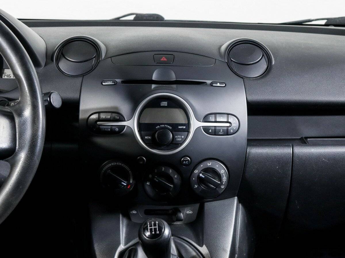 Mazda 2 с пробегом — 2008 год. Фото: #12