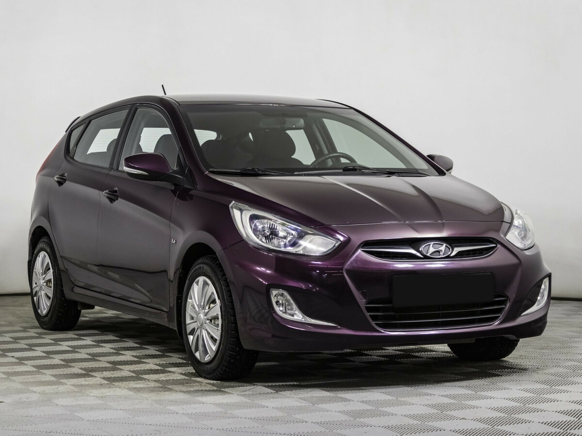 Hyundai Solaris с пробегом — 2012 год. Фото: #2