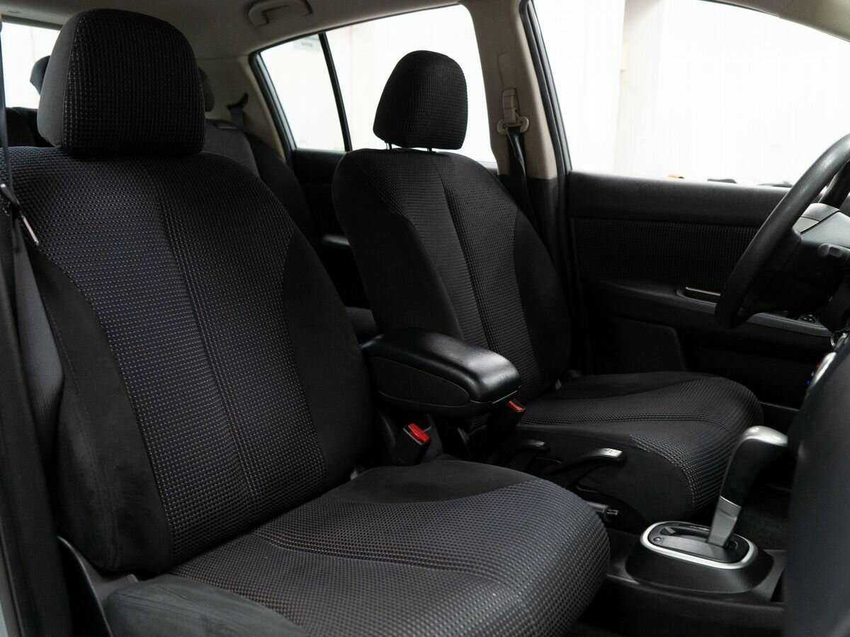 Nissan Tiida с пробегом — 2011 год. Фото: #11