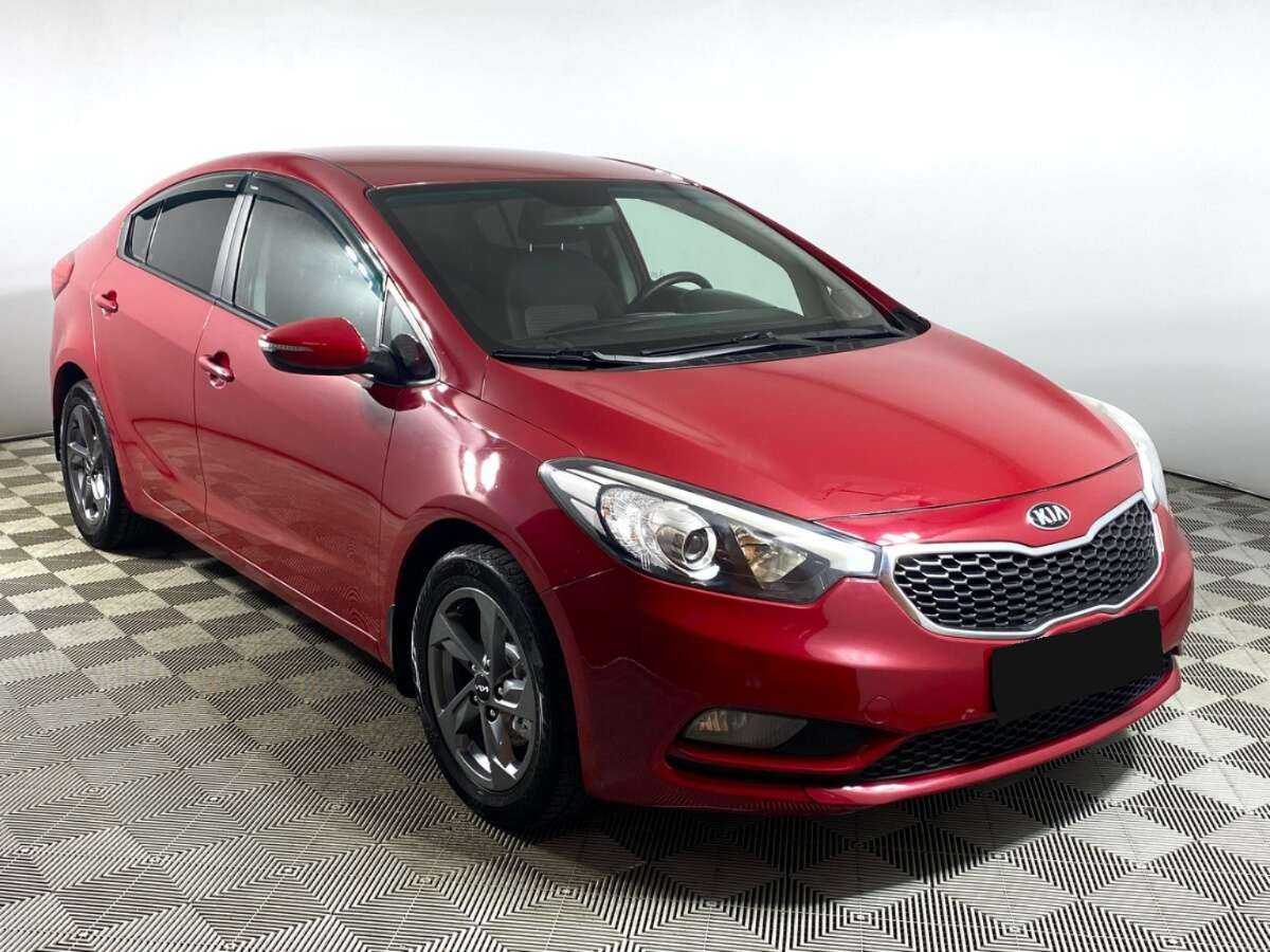 Kia Cerato с пробегом — 2013 год. Фото: #1