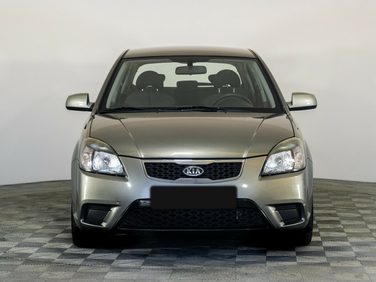 Kia Rio с пробегом — 2010 год. Фото: #1