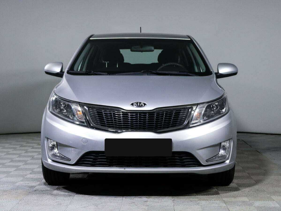 Kia Rio с пробегом — 2013 год. Фото: #1