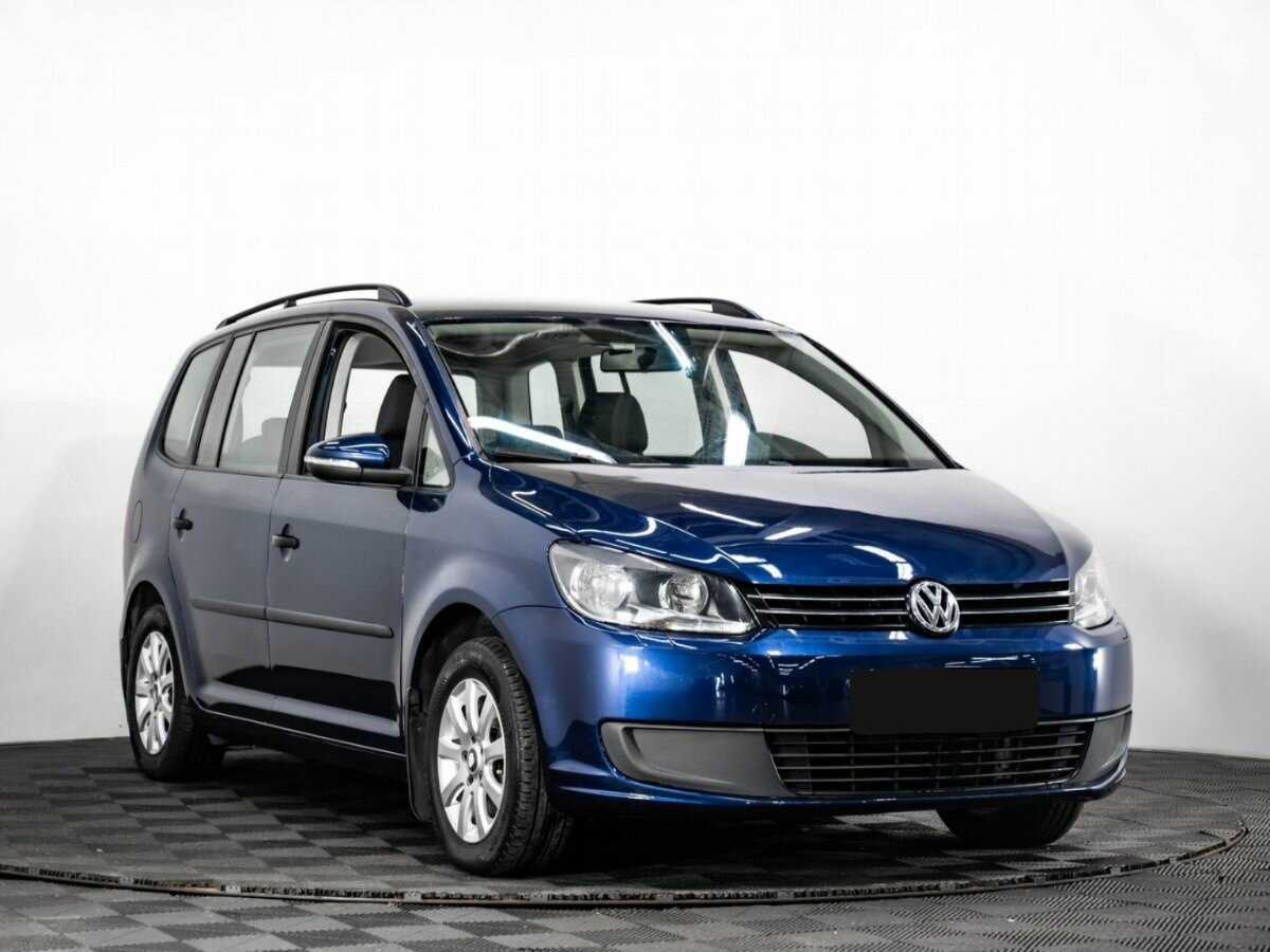 Volkswagen Touran с пробегом — 2012 год. Фото: #2