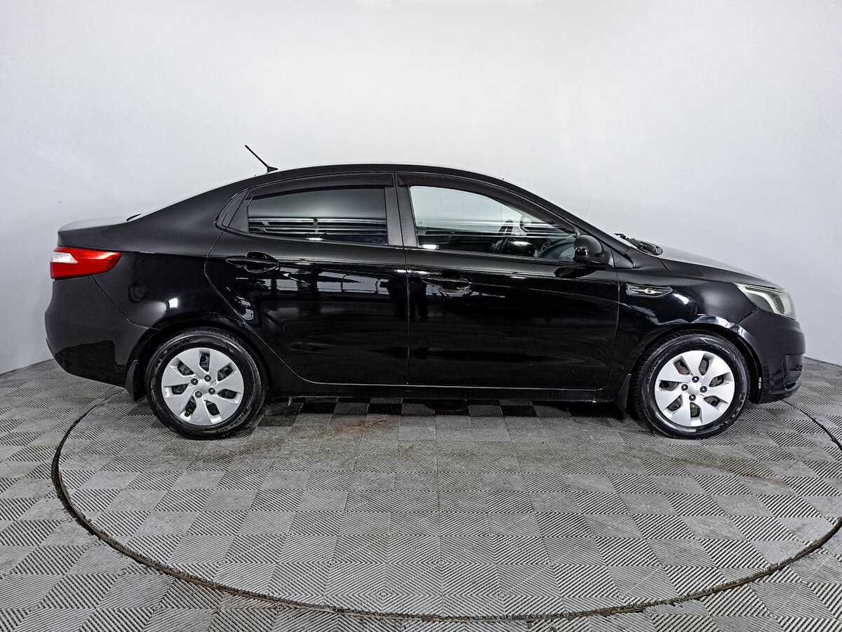 Kia Rio с пробегом — 2014 год. Фото: #3