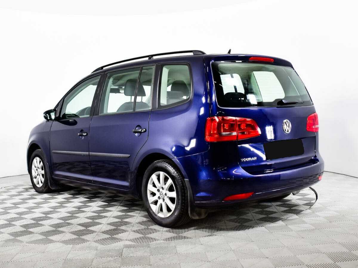 Volkswagen Touran с пробегом — 2012 год. Фото: #6