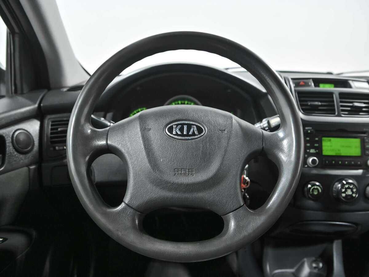 Kia Sportage с пробегом — 2009 год. Фото: #7