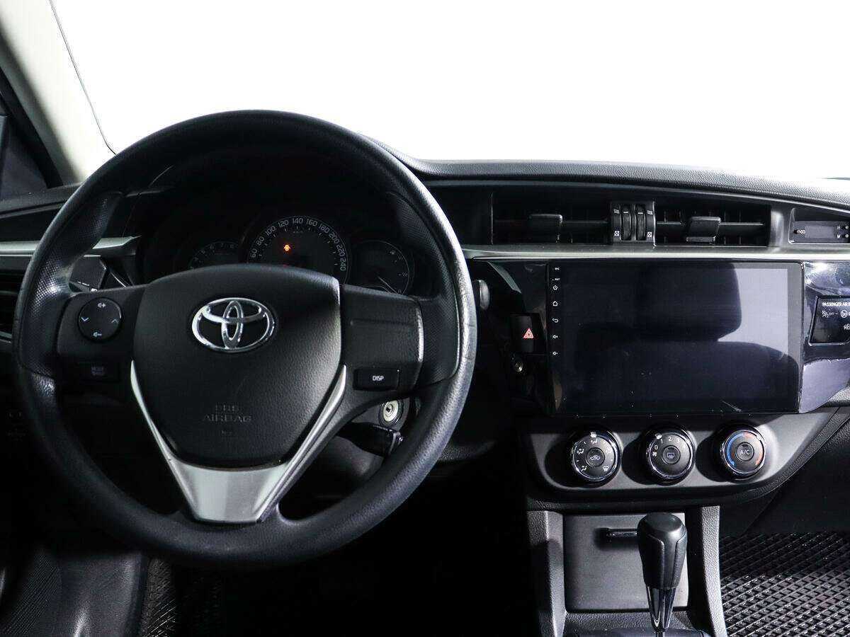 Toyota Corolla с пробегом — 2013 год. Фото: #8