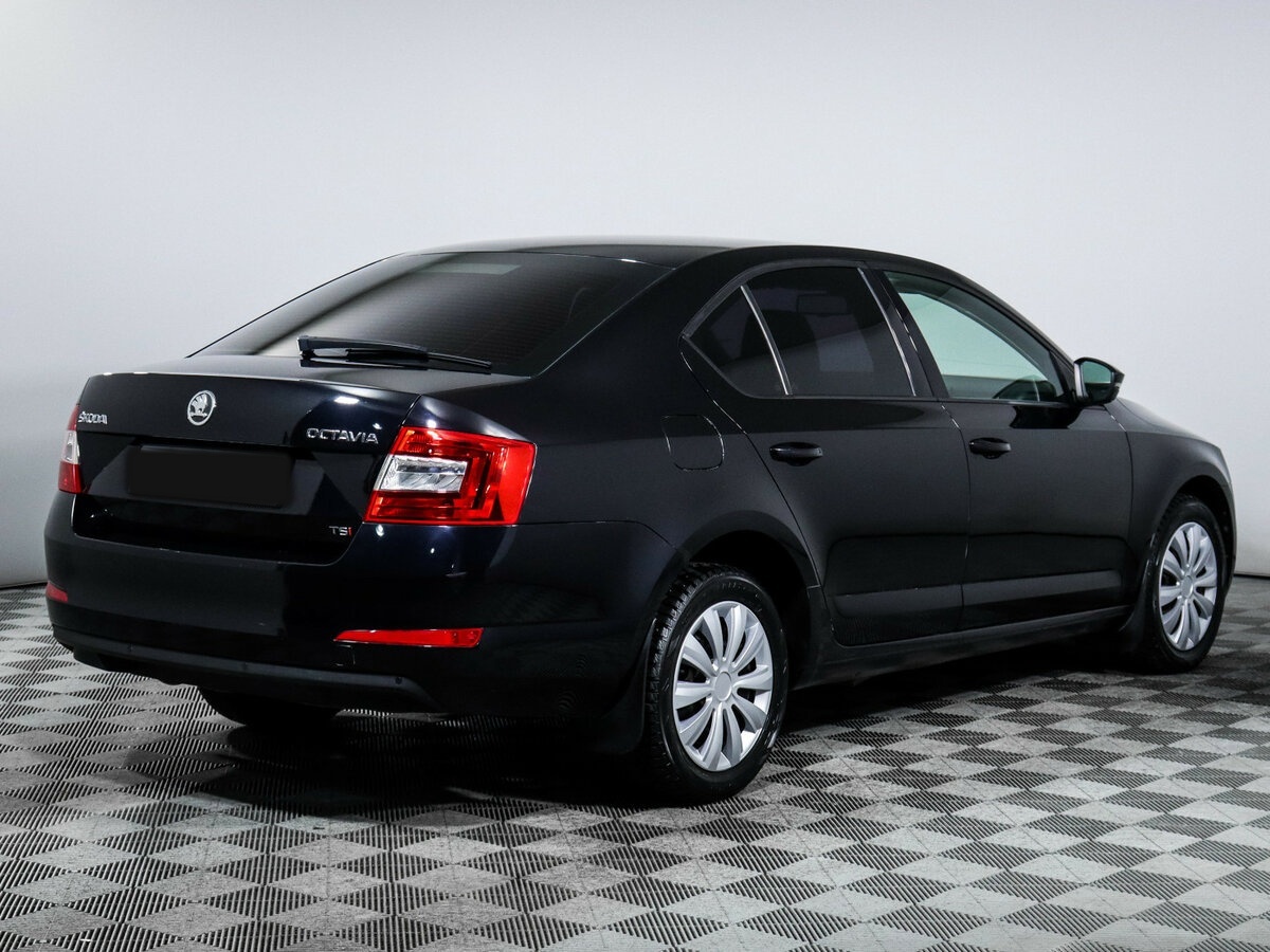 Skoda Octavia с пробегом — 2013 год. Фото: #3