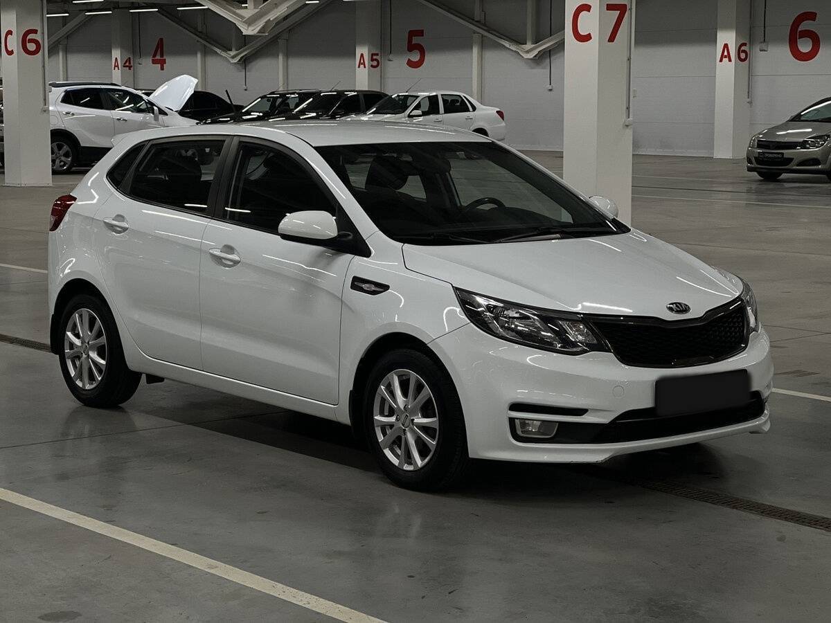 Kia Rio с пробегом — 2015 год. Фото: #2