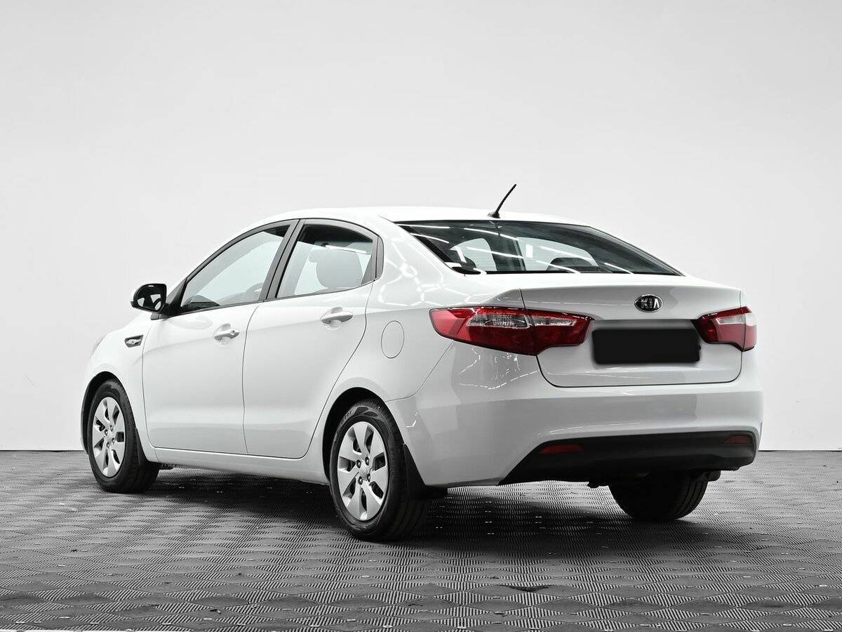 Kia Rio с пробегом — 2013 год. Фото: #2