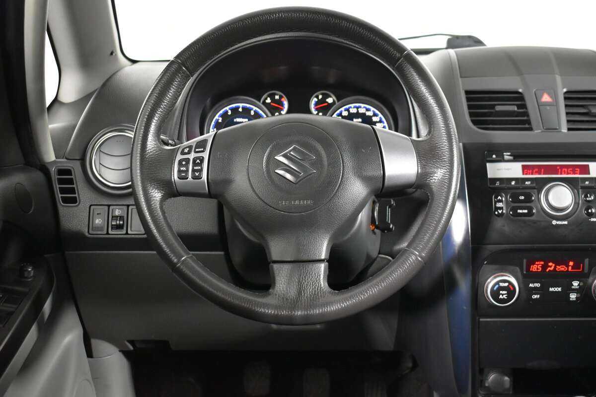Suzuki SX4 с пробегом — 2013 год. Фото: #11