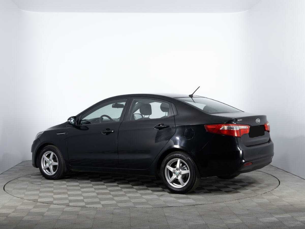 Kia Rio с пробегом — 2014 год. Фото: #6