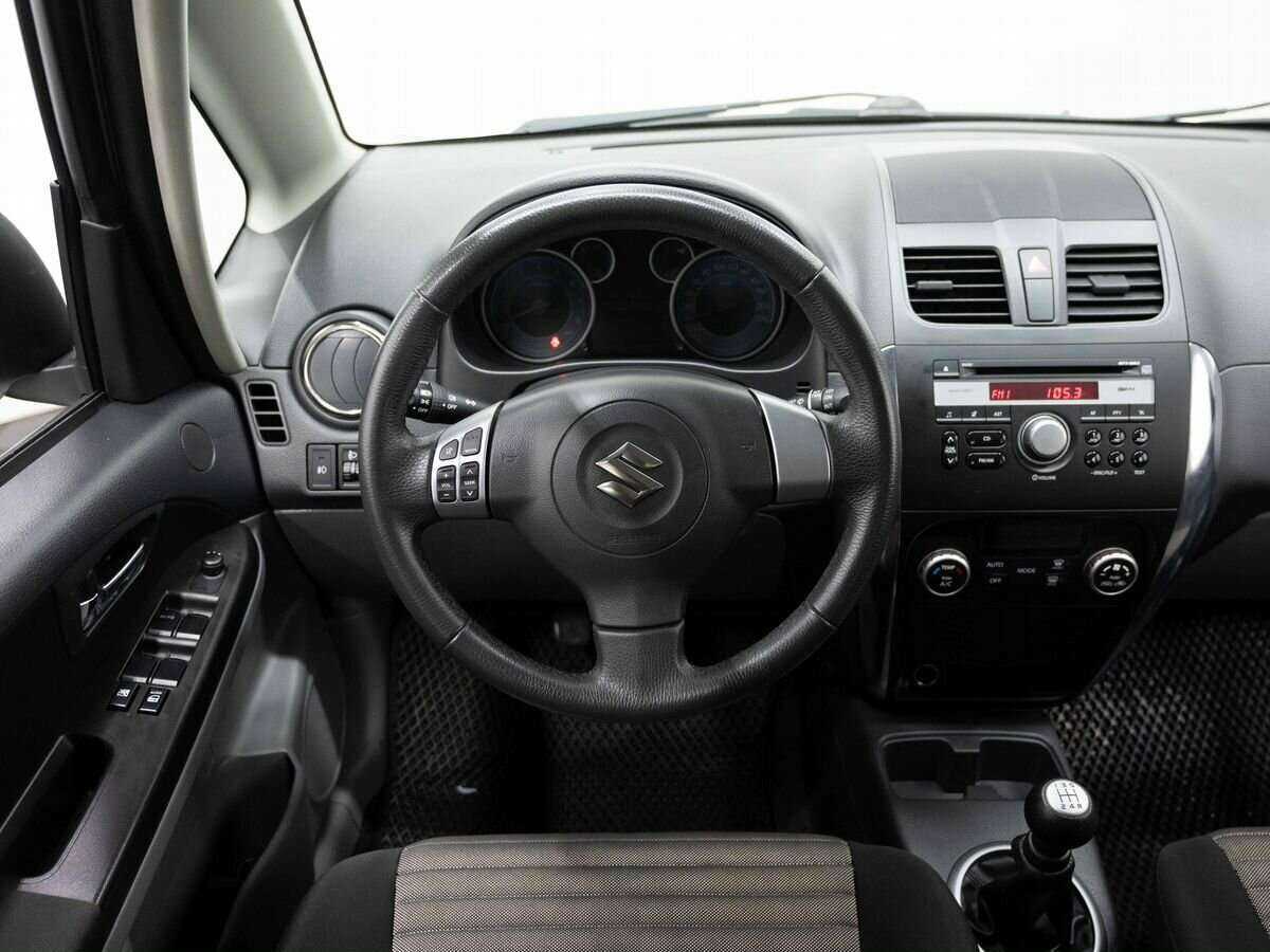 Suzuki SX4 с пробегом — 2013 год. Фото: #12
