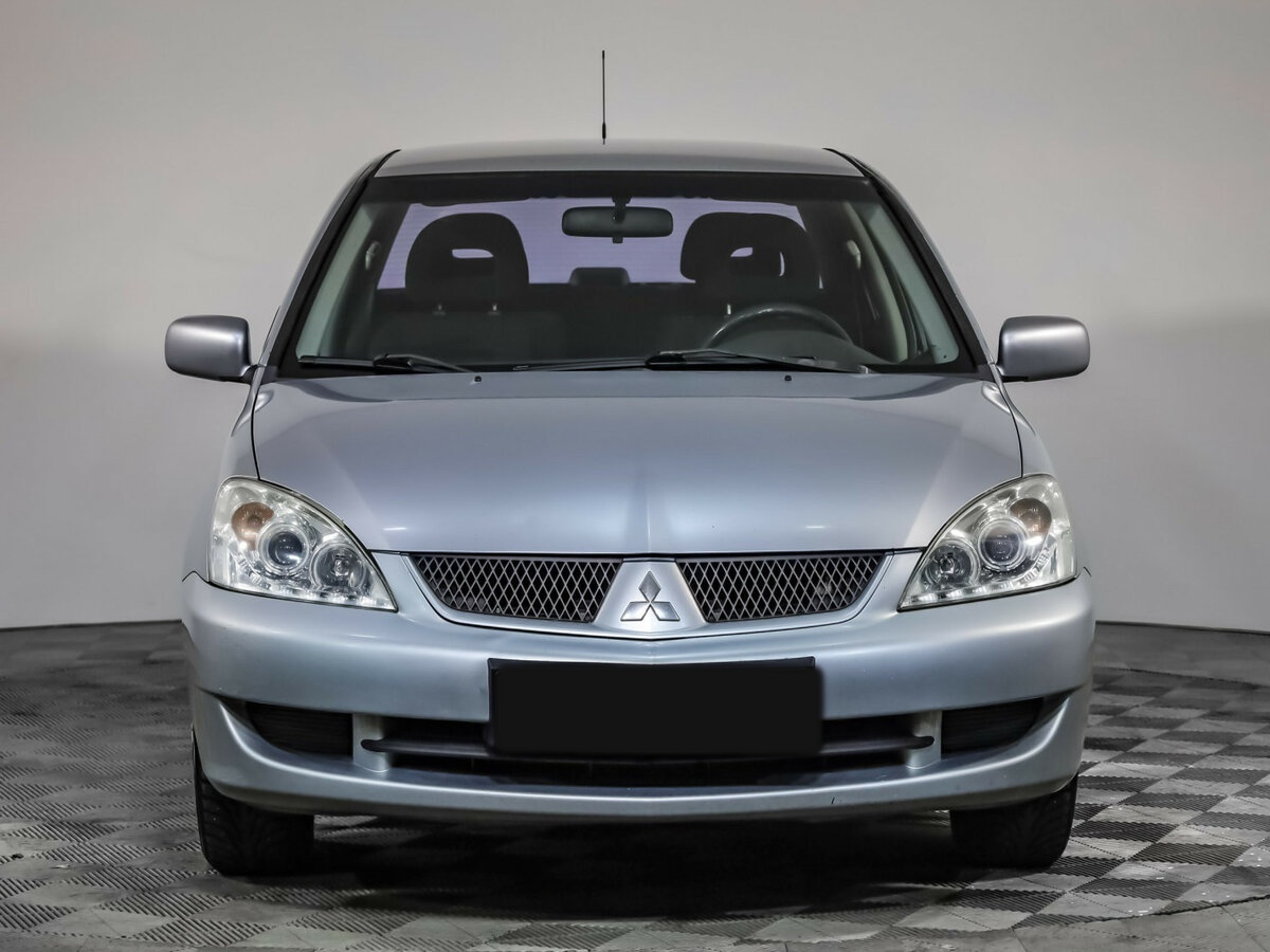 Mitsubishi Lancer с пробегом — 2006 год. Фото: #1