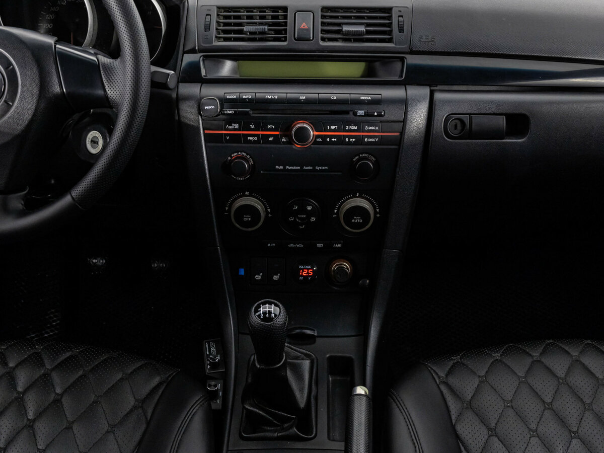 Mazda 3 с пробегом — 2006 год. Фото: #8