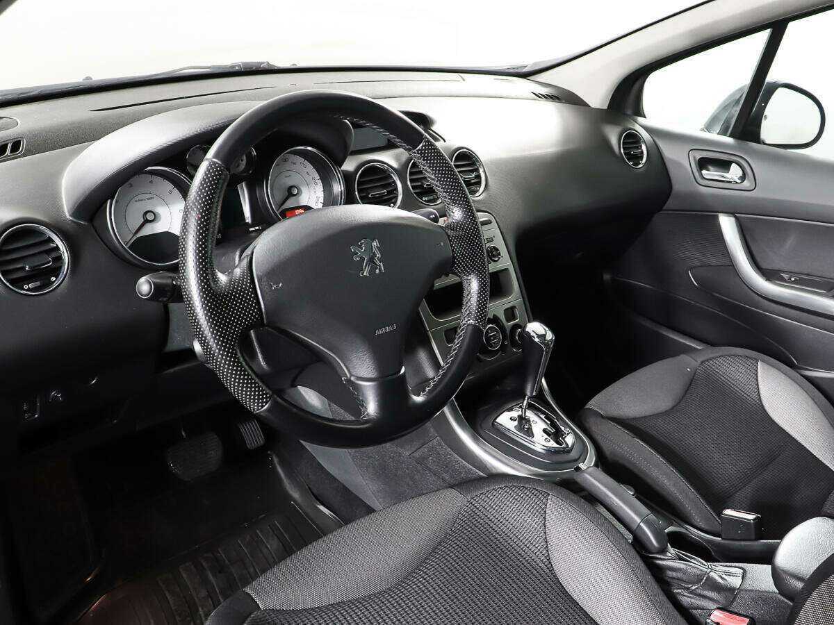 Peugeot 308 с пробегом — 2010 год. Фото: #11