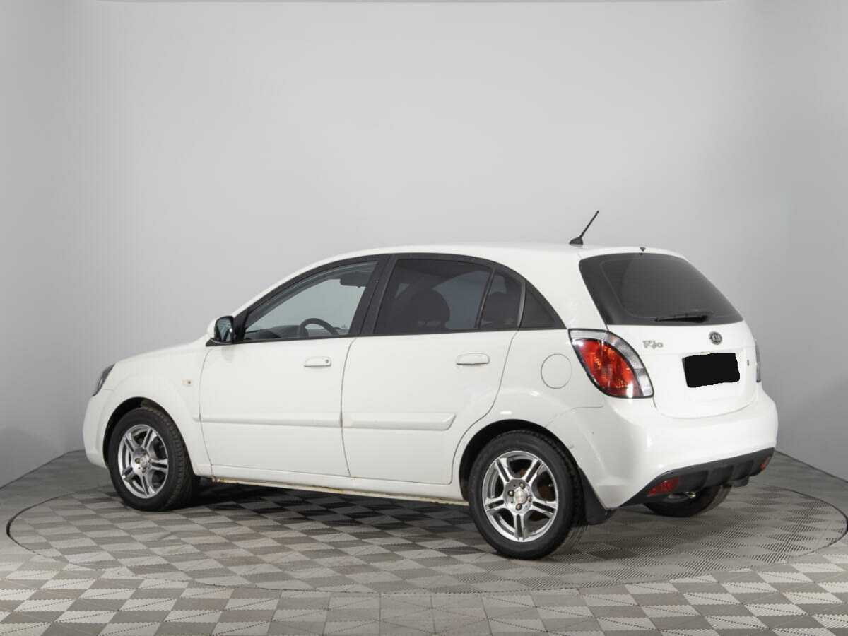 Kia Rio с пробегом — 2011 год. Фото: #6