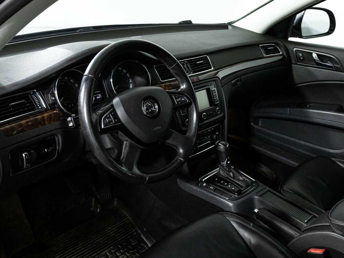 Skoda Superb с пробегом — 2013 год. Фото: #10