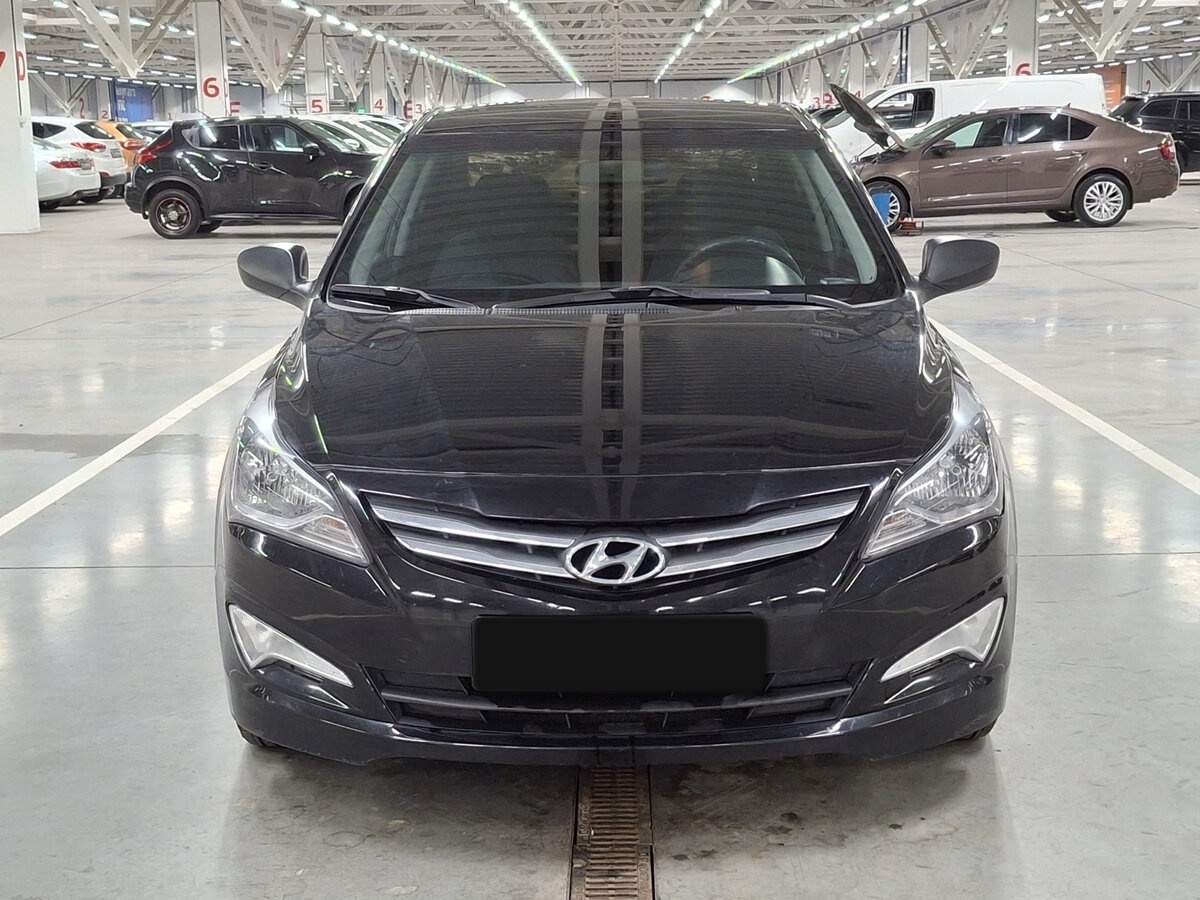 Hyundai Solaris с пробегом — 2015 год. Фото: #1