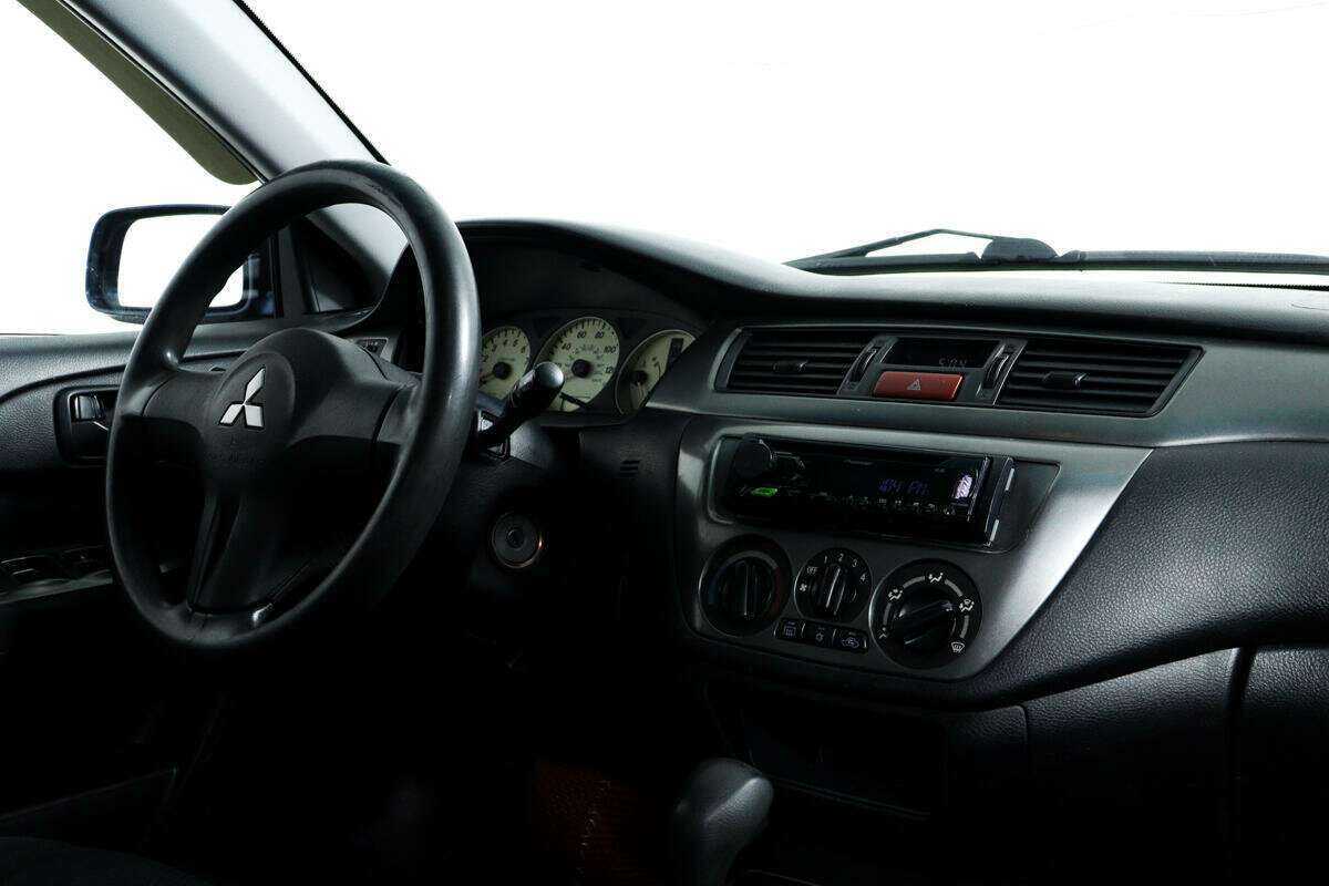 Mitsubishi Lancer с пробегом — 2006 год. Фото: #8