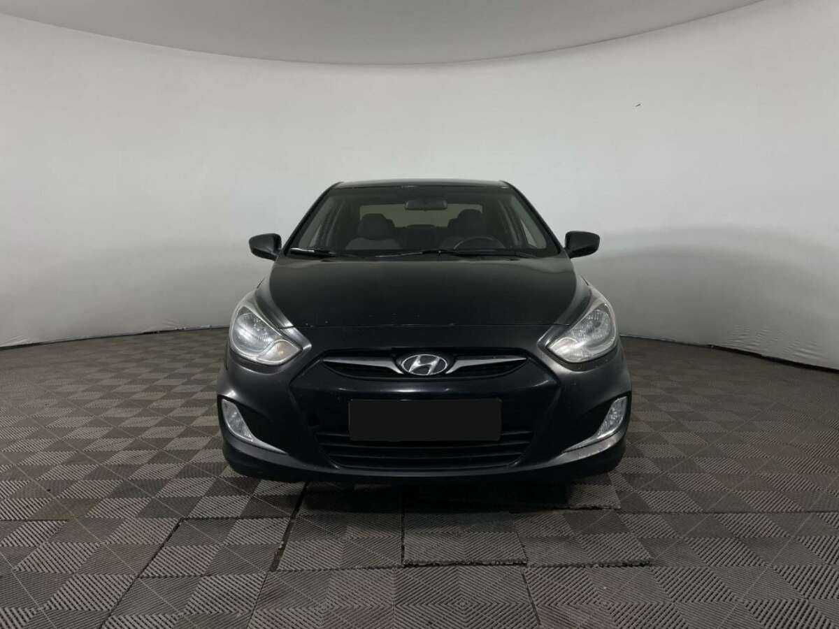 Hyundai Solaris с пробегом — 2011 год. Фото: #1