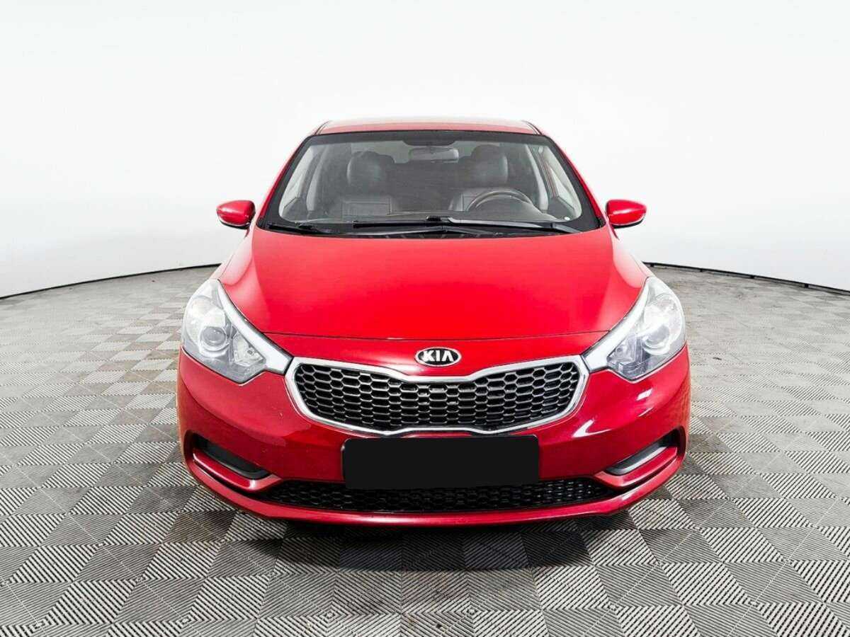 Kia Cerato с пробегом — 2013 год. Фото: #1