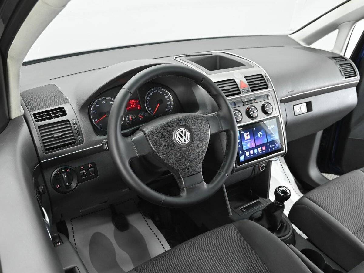Volkswagen Touran с пробегом — 2007 год. Фото: #7