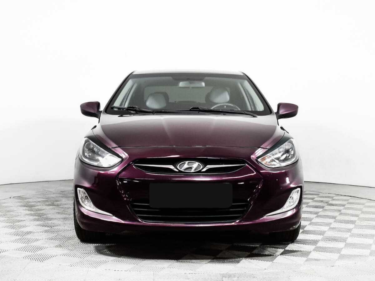 Hyundai Solaris с пробегом — 2013 год. Фото: #1