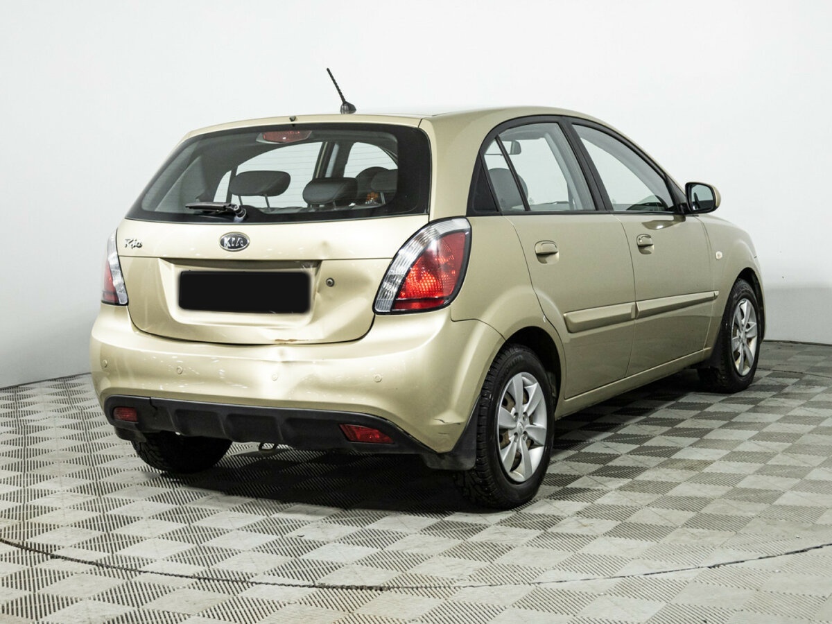 Kia Rio с пробегом — 2011 год. Фото: #4