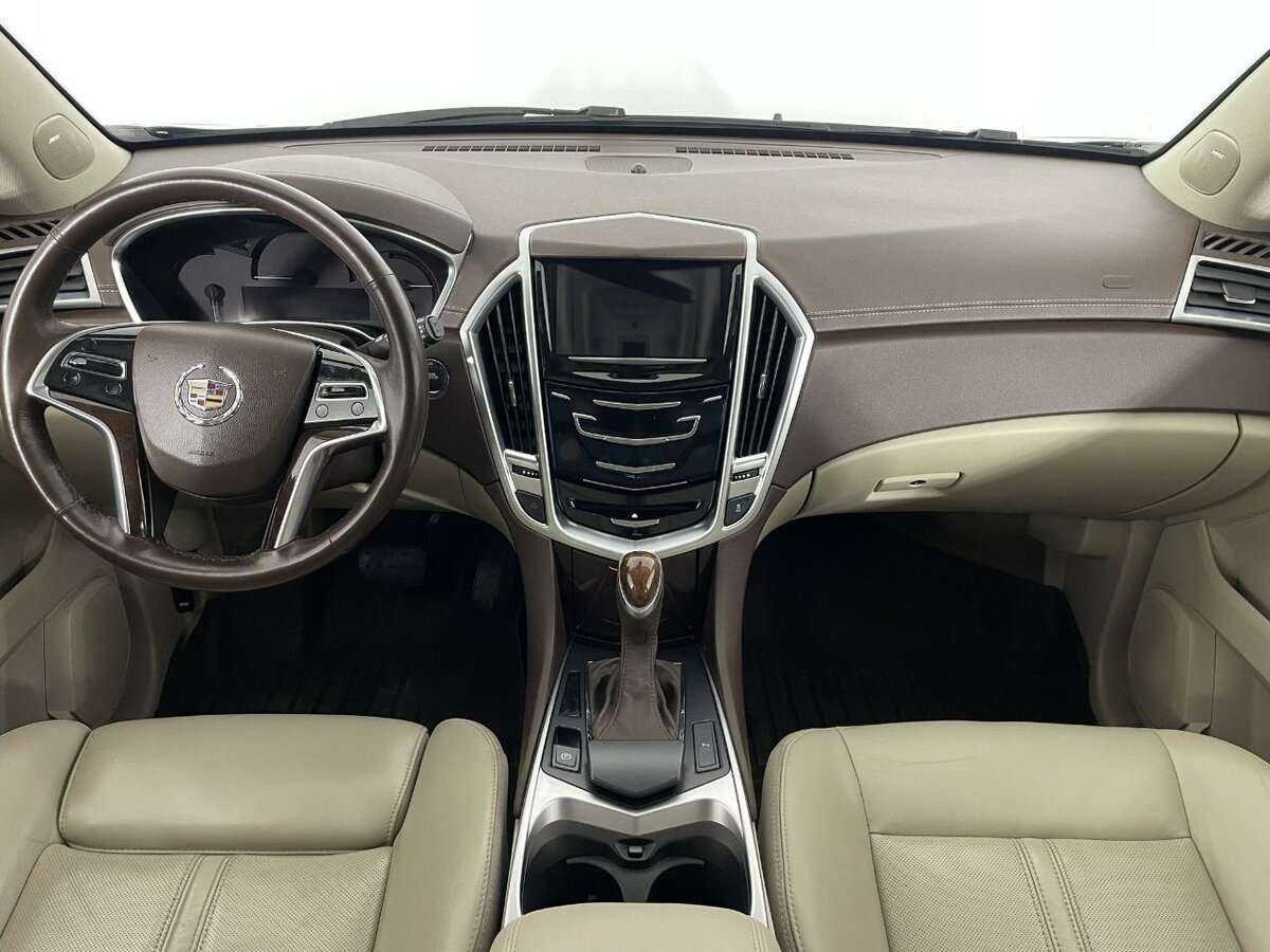 Cadillac SRX с пробегом — 2014 год. Фото: #6