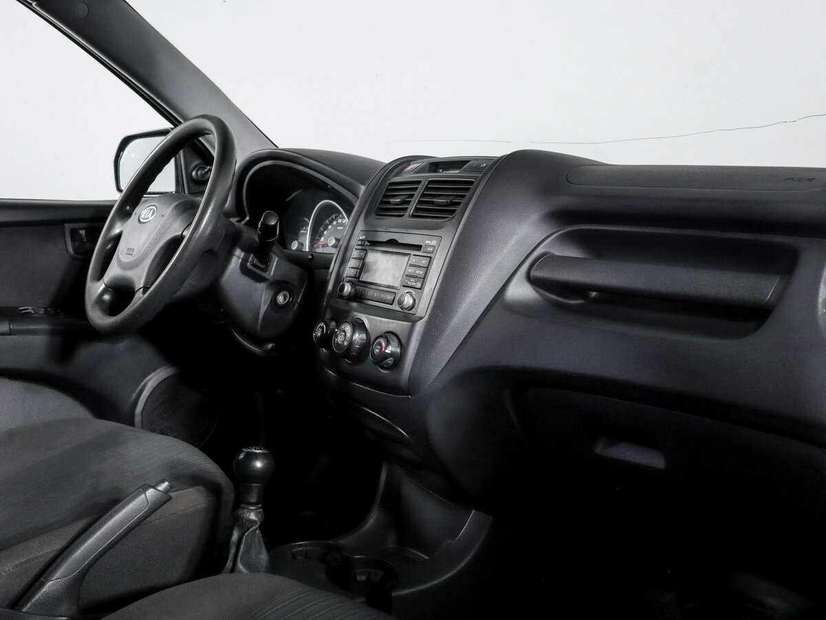 Kia Sportage с пробегом — 2009 год. Фото: #8