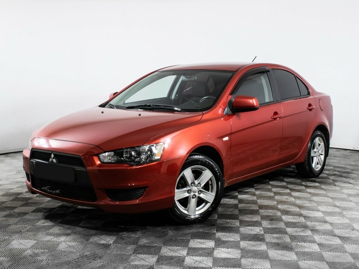 Mitsubishi Lancer с пробегом — 2010 год. Посмотреть фото