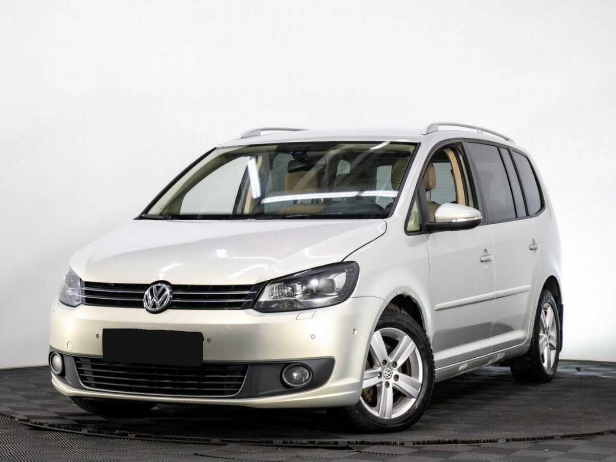 Volkswagen Touran с пробегом — 2013 год. Фото: #0
