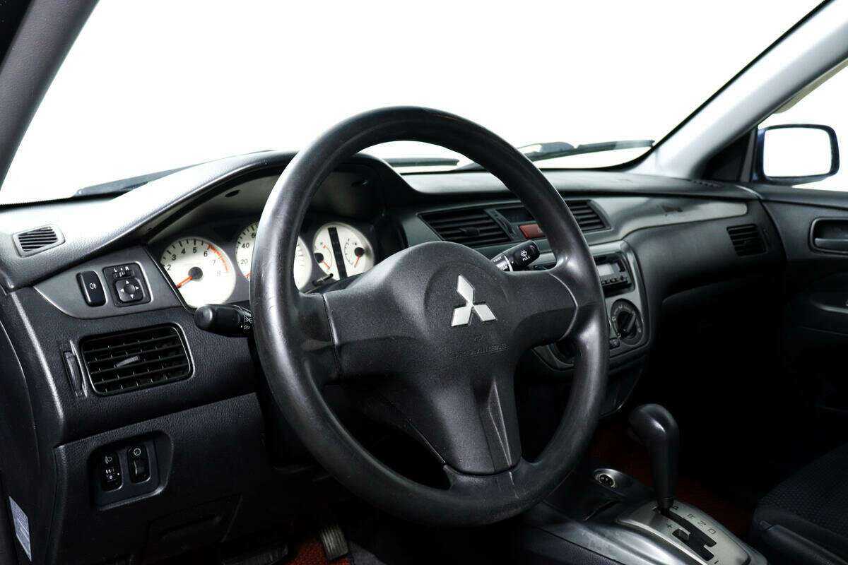Mitsubishi Lancer с пробегом — 2006 год. Фото: #12