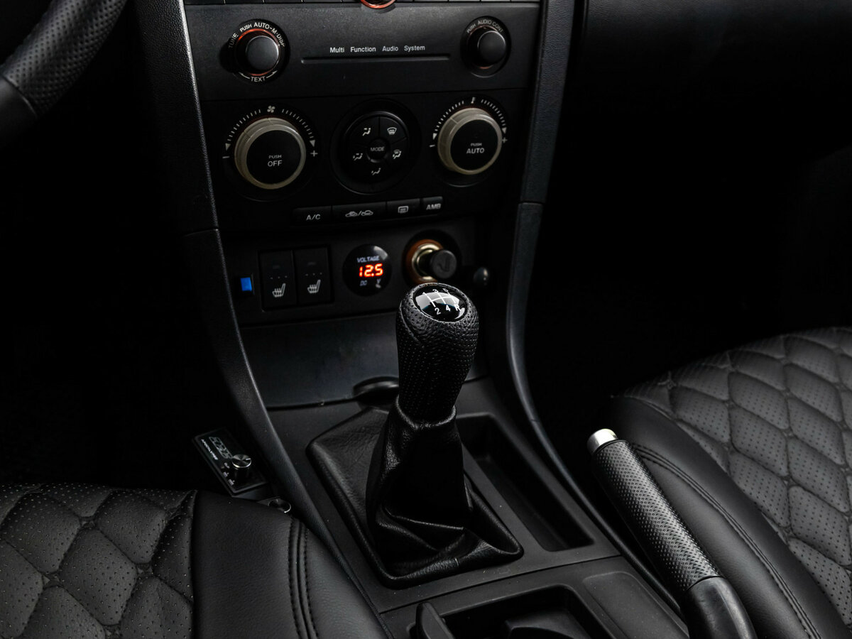Mazda 3 с пробегом — 2006 год. Фото: #9