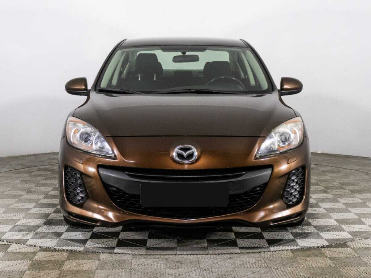 Mazda 3 с пробегом — 2011 год. Фото: #1