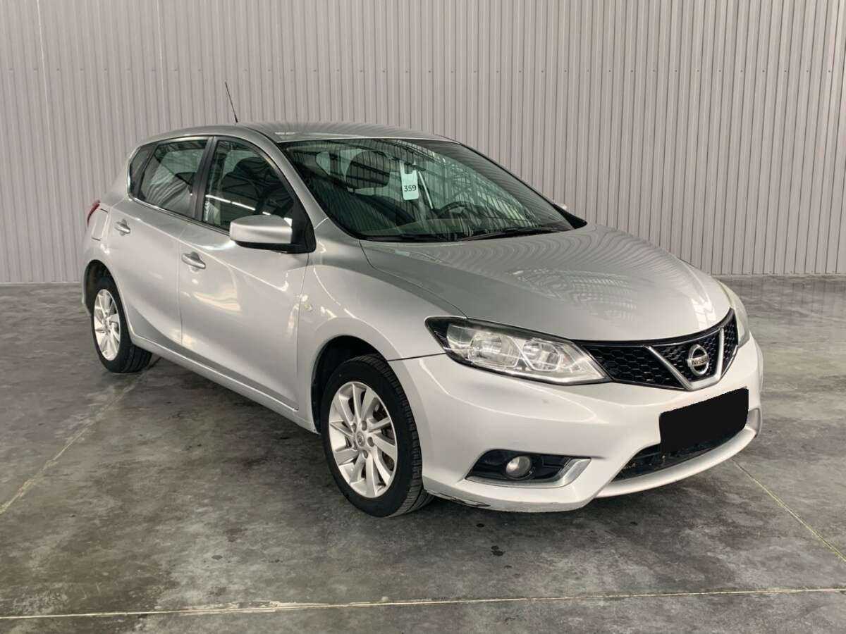 Nissan Tiida с пробегом — 2015 год. Фото: #2