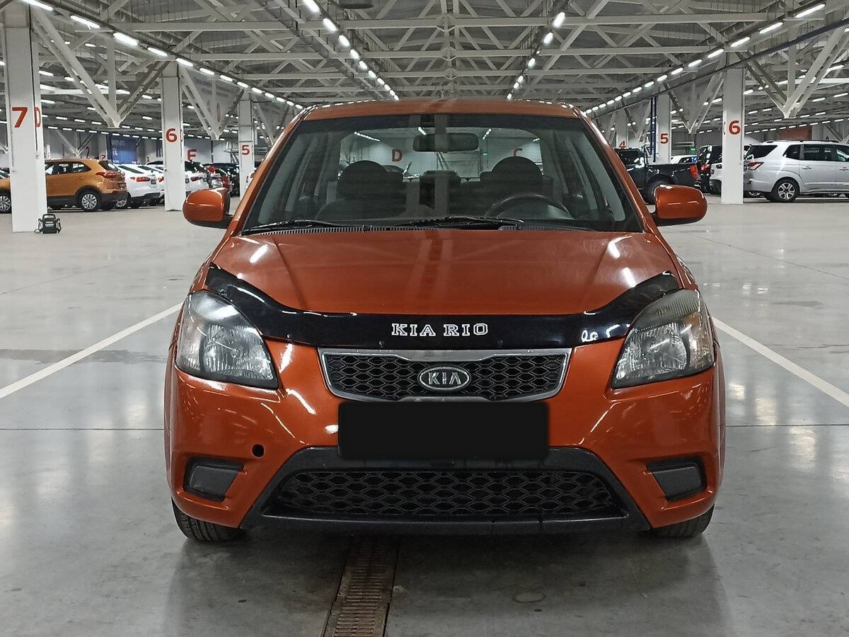 Kia Rio с пробегом — 2011 год. Фото: #1