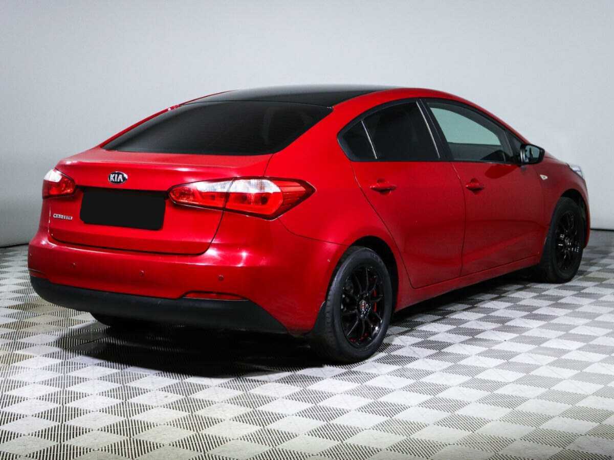 Kia Cerato с пробегом — 2014 год. Фото: #4