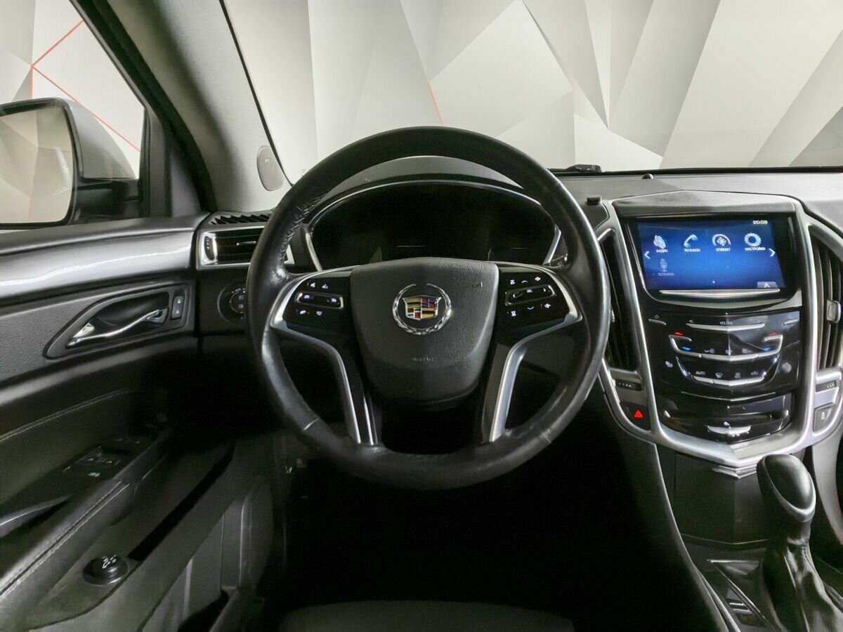 Cadillac SRX с пробегом — 2014 год. Фото: #14