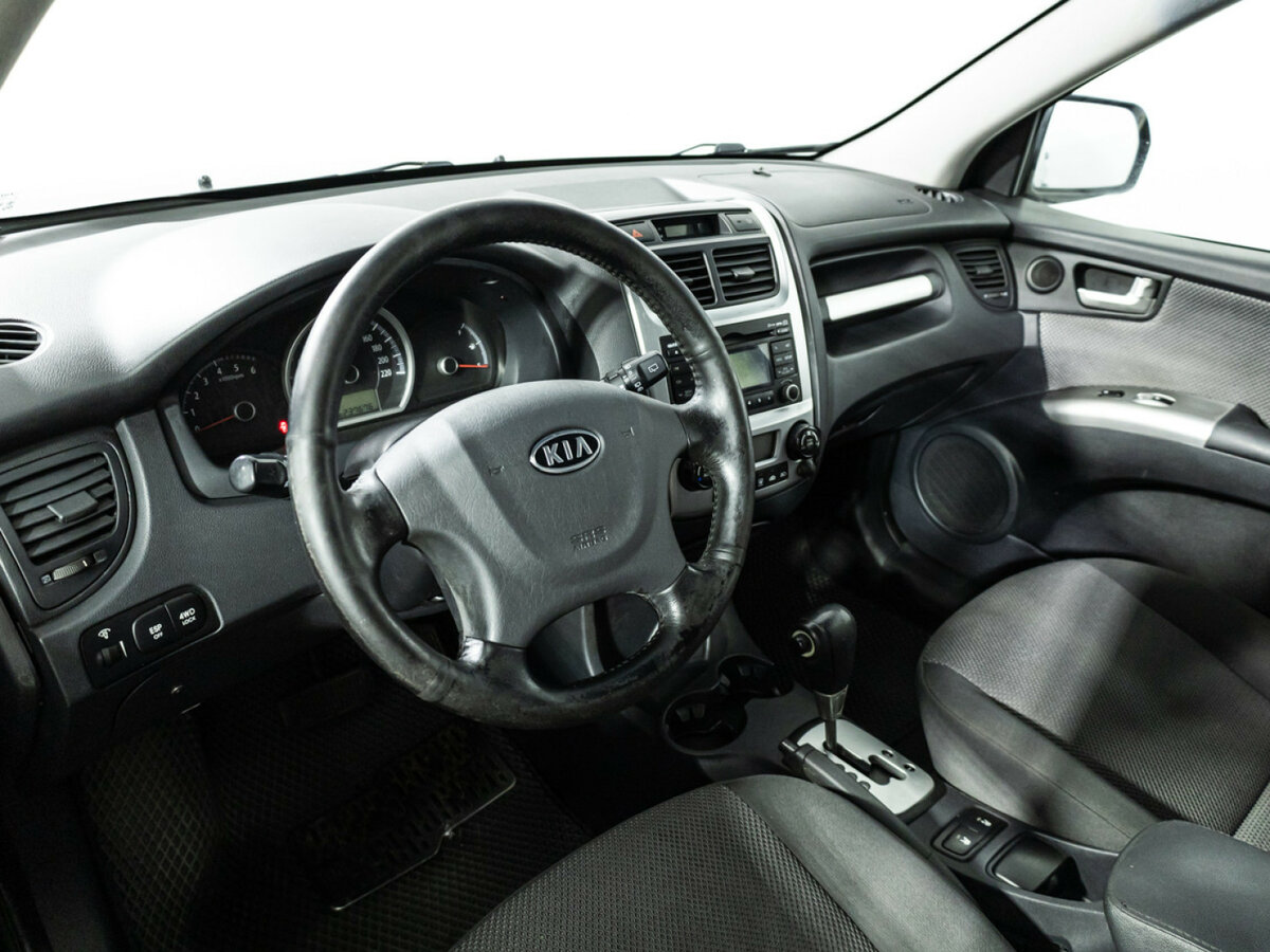 Kia Sportage с пробегом — 2009 год. Фото: #10