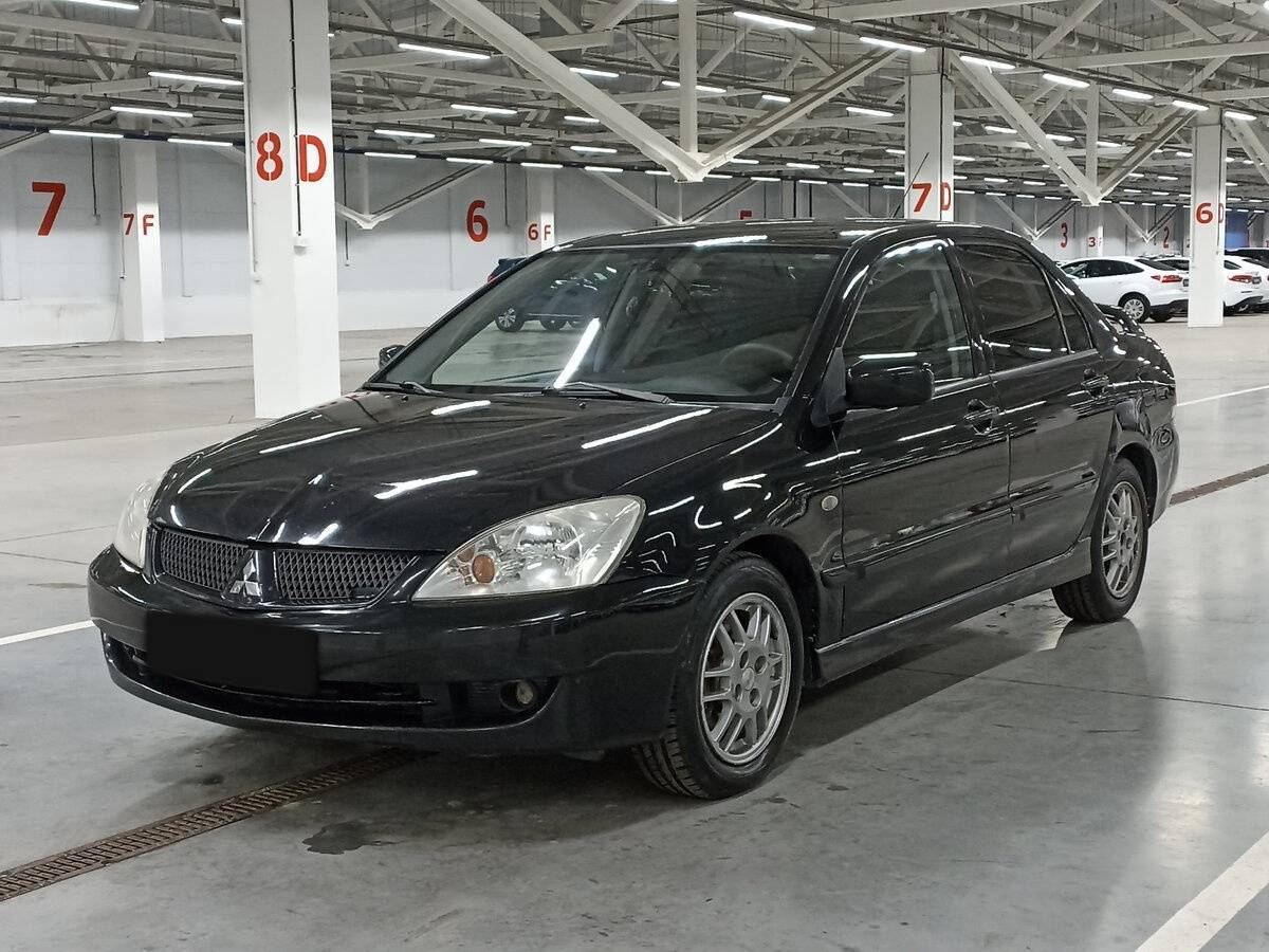 Mitsubishi Lancer с пробегом — 2006 год. Посмотреть фото