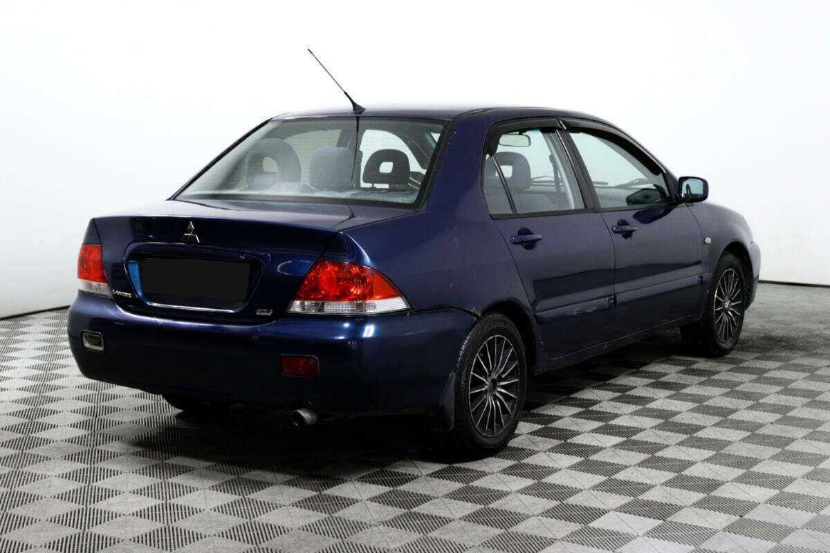 Mitsubishi Lancer с пробегом — 2006 год. Фото: #4