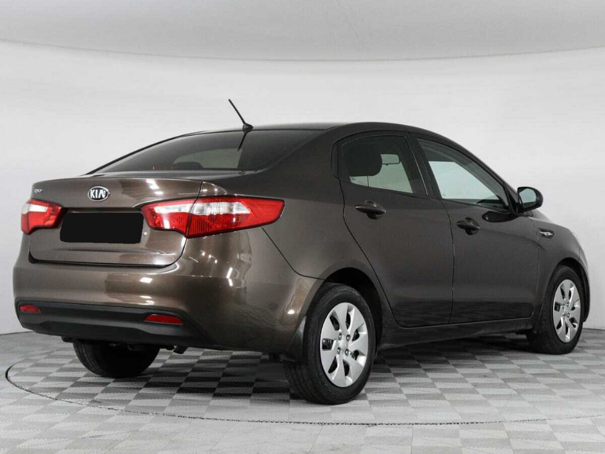 Kia Rio с пробегом — 2014 год. Фото: #4