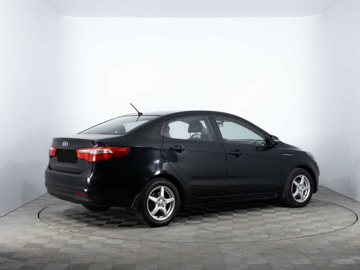 Kia Rio с пробегом — 2014 год. Фото: #4