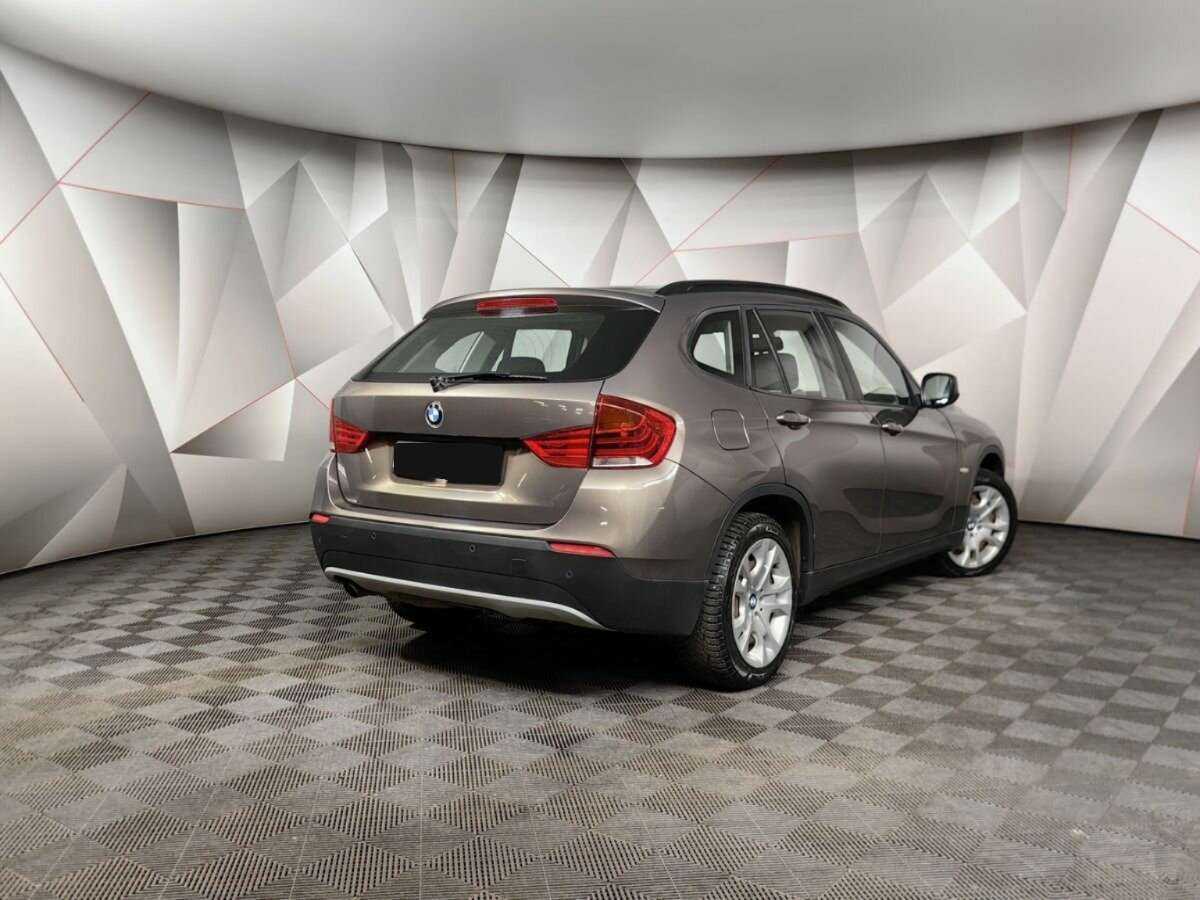BMW X1 с пробегом — 2011 год. Фото: #1