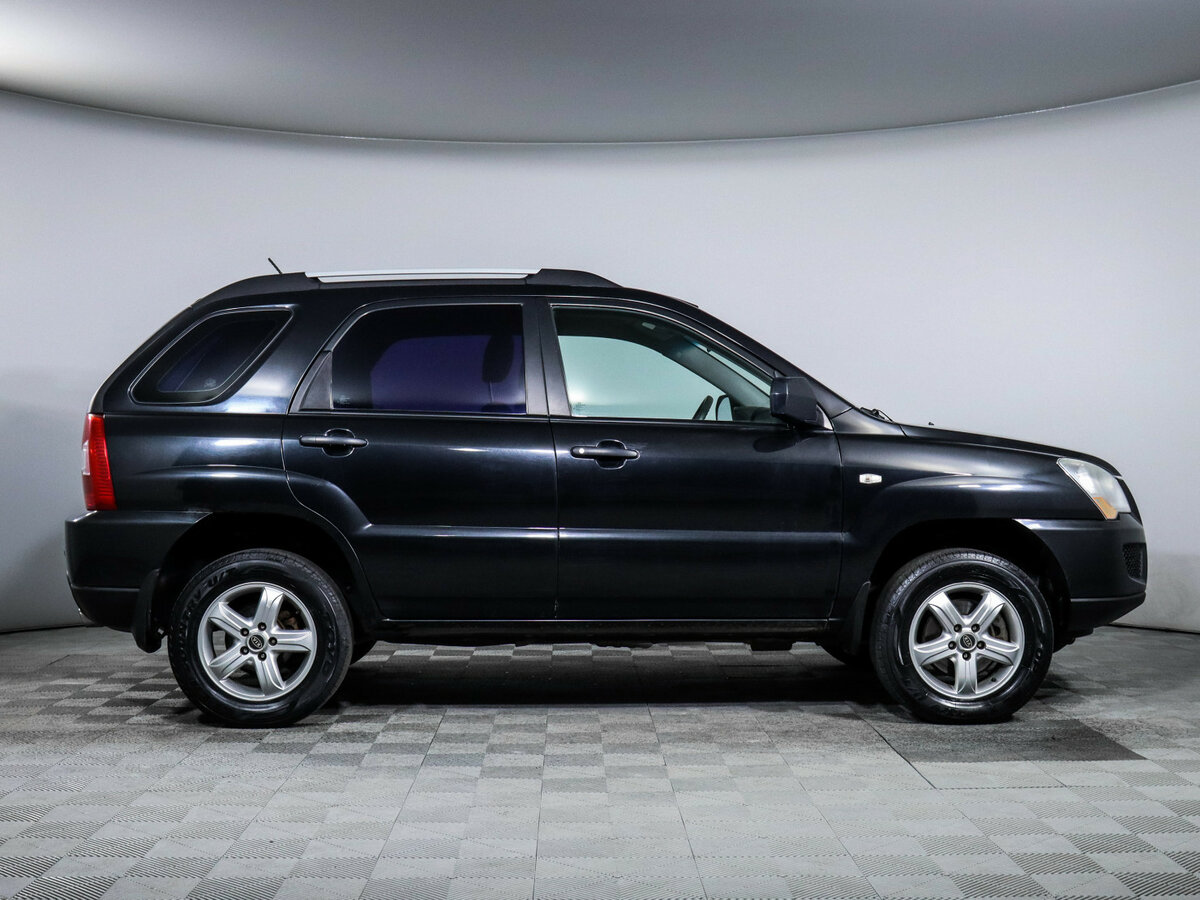 Kia Sportage с пробегом — 2009 год. Фото: #3