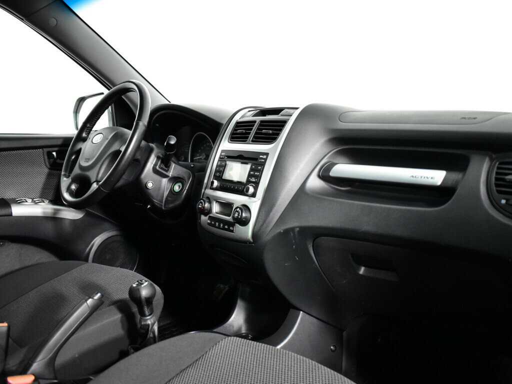 Kia Sportage с пробегом — 2010 год. Фото: #8