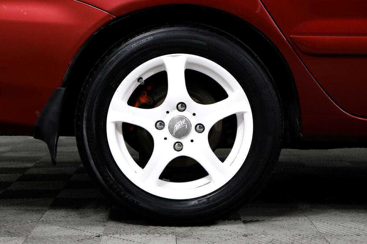 Mitsubishi Lancer с пробегом — 2005 год. Фото: #13